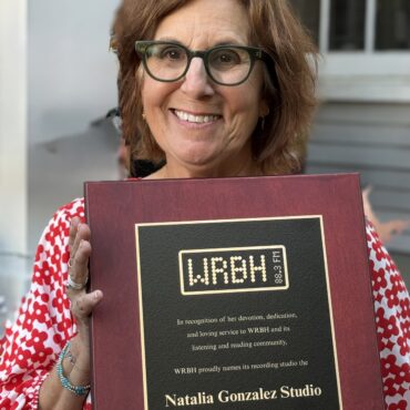 Natalia with studio dedication Plaque